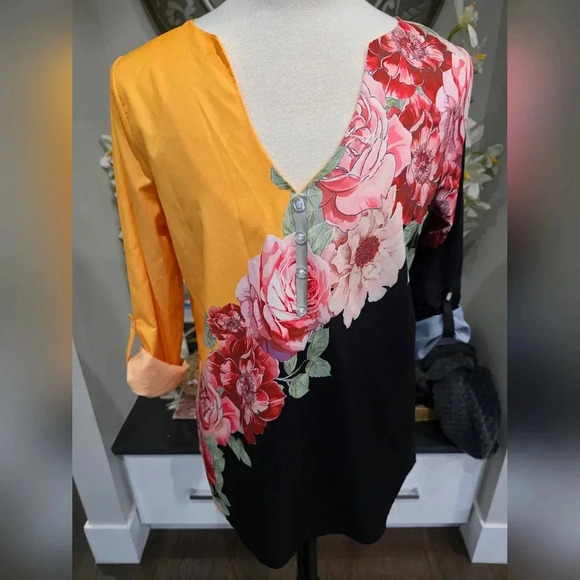 Embrace Bold Style with This Eye-Catching Floral Top - Picture 3 of 7